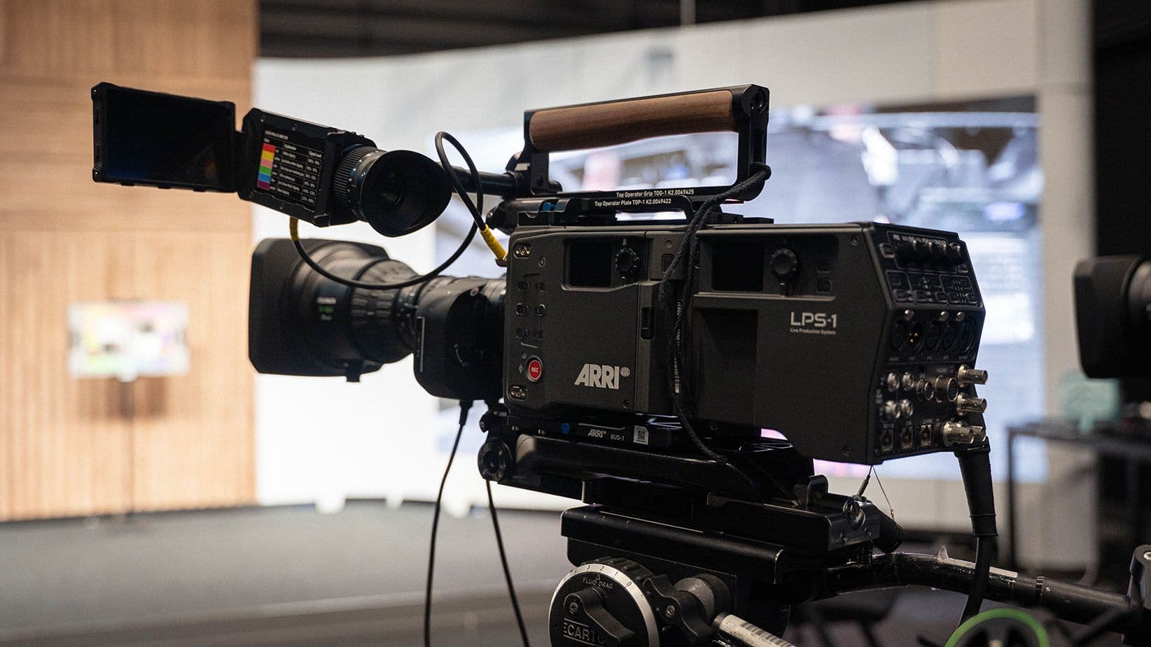 Close view of the ARRI LPS-1 Live Production System fiber back mounted behind an ALEXA 35 Live on a fluid head.