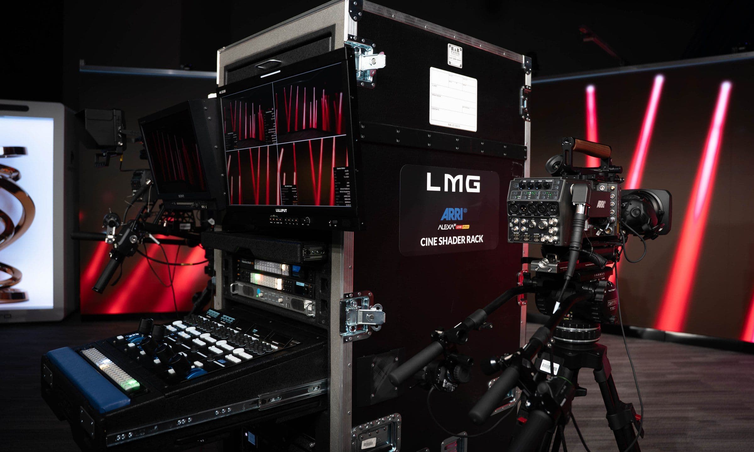 ARRI ALEXA 35 Live Cine Shader Rack in a rolling LMG road case, with monitors, scopes and Skaarhoj camera control panels, an ALEXA 35 Live on sticks beside it.
